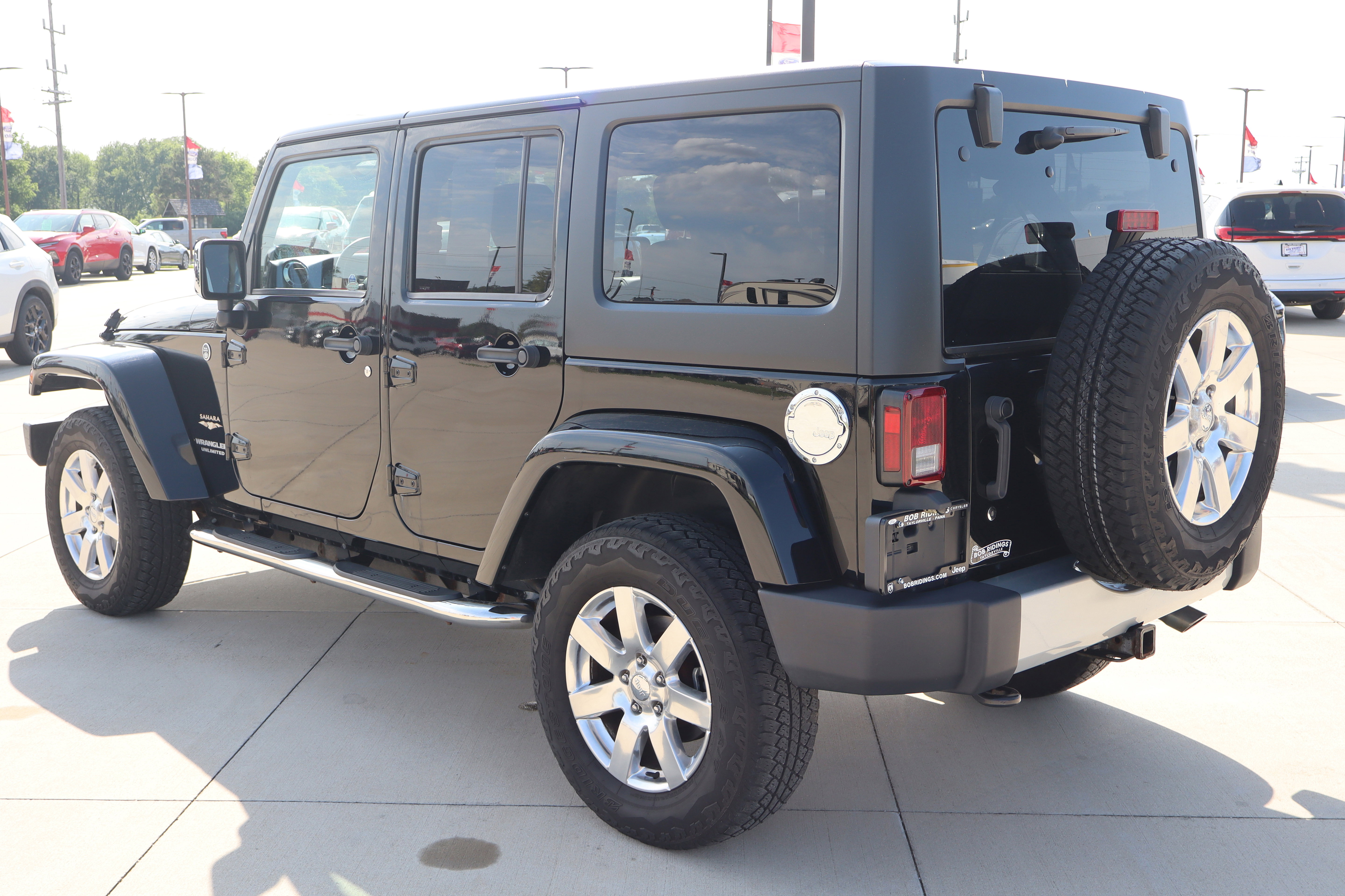 Used 2012 Jeep Wrangler Unlimited Sahara w/ Dual Top Group AWD/4WD image 7