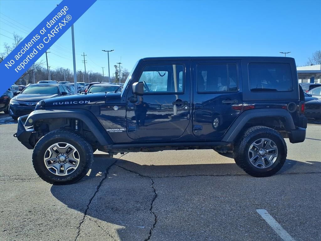 Used 2013 Jeep Wrangler Unlimited Rubicon w/ Dual Top Group image 9