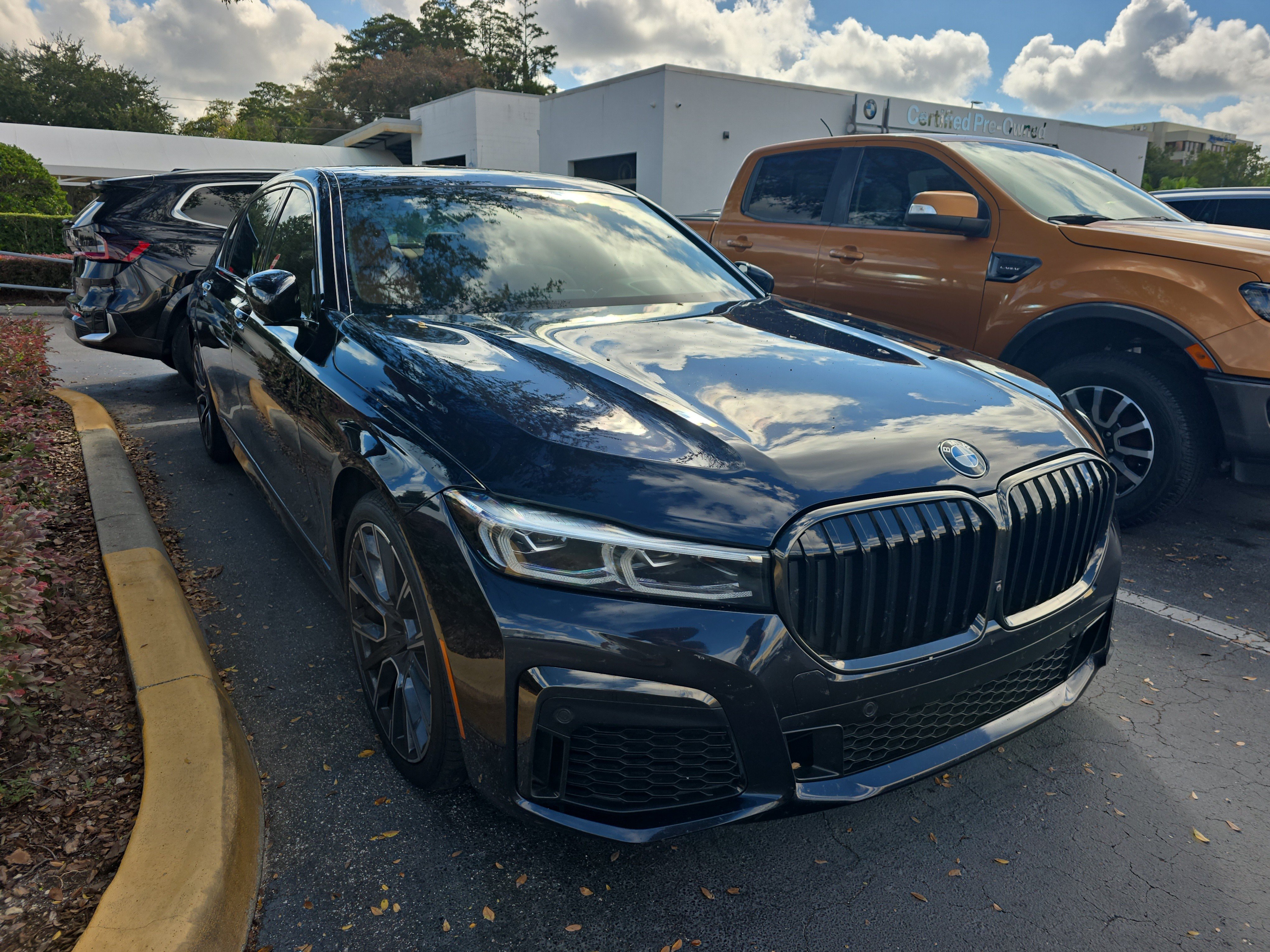 Used 2021 BMW 740i xDrive w/ M Sport Package AWD/4WD image 1
