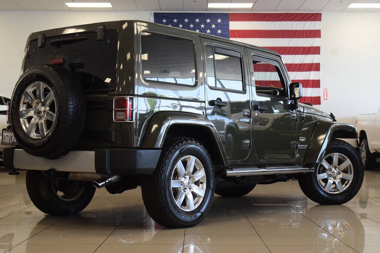 Used 2015 Jeep Wrangler Unlimited Sahara w/ Dual Top Group AWD/4WD image 33