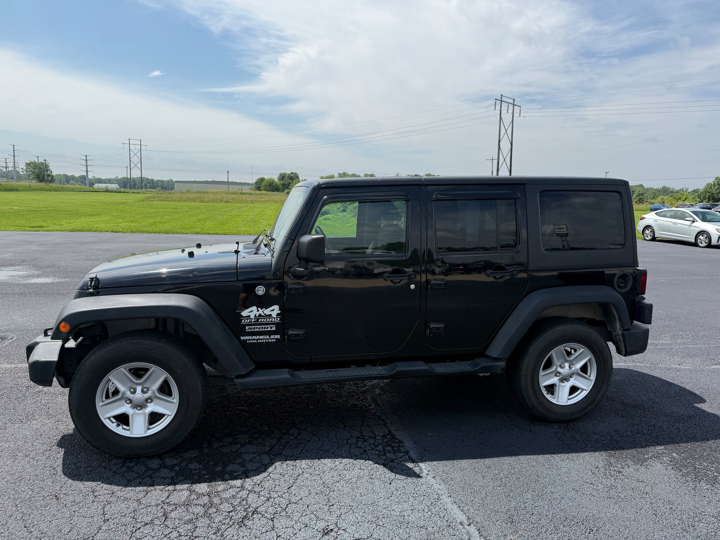 Used 2013 Jeep Wrangler Unlimited Sport w/ Dual Top Group AWD/4WD image 4