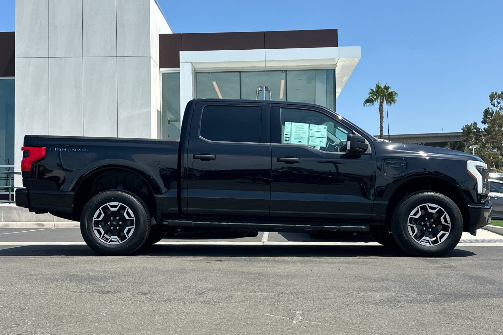 Certified 2023 Ford F150 Lightning XLT w/ Tow Technology Package AWD/4WD image 2