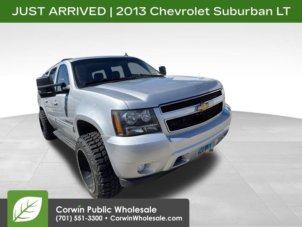 Used 2013 Chevrolet Suburban LT w/ Luxury Package AWD/4WD image 1
