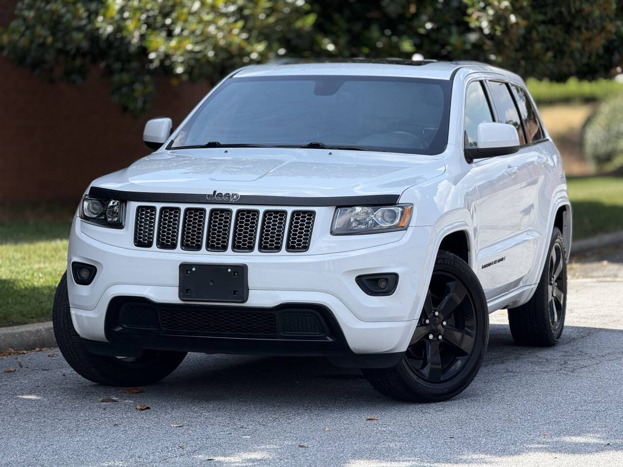 Used 2015 Jeep Grand Cherokee Altitude AWD/4WD image 1