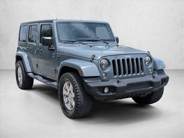 Used 2014 Jeep Wrangler Unlimited Sahara AWD/4WD video 3
