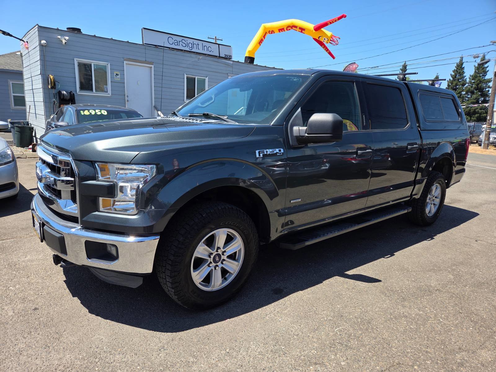 Used 2015 Ford F150 XLT AWD/4WD image 1