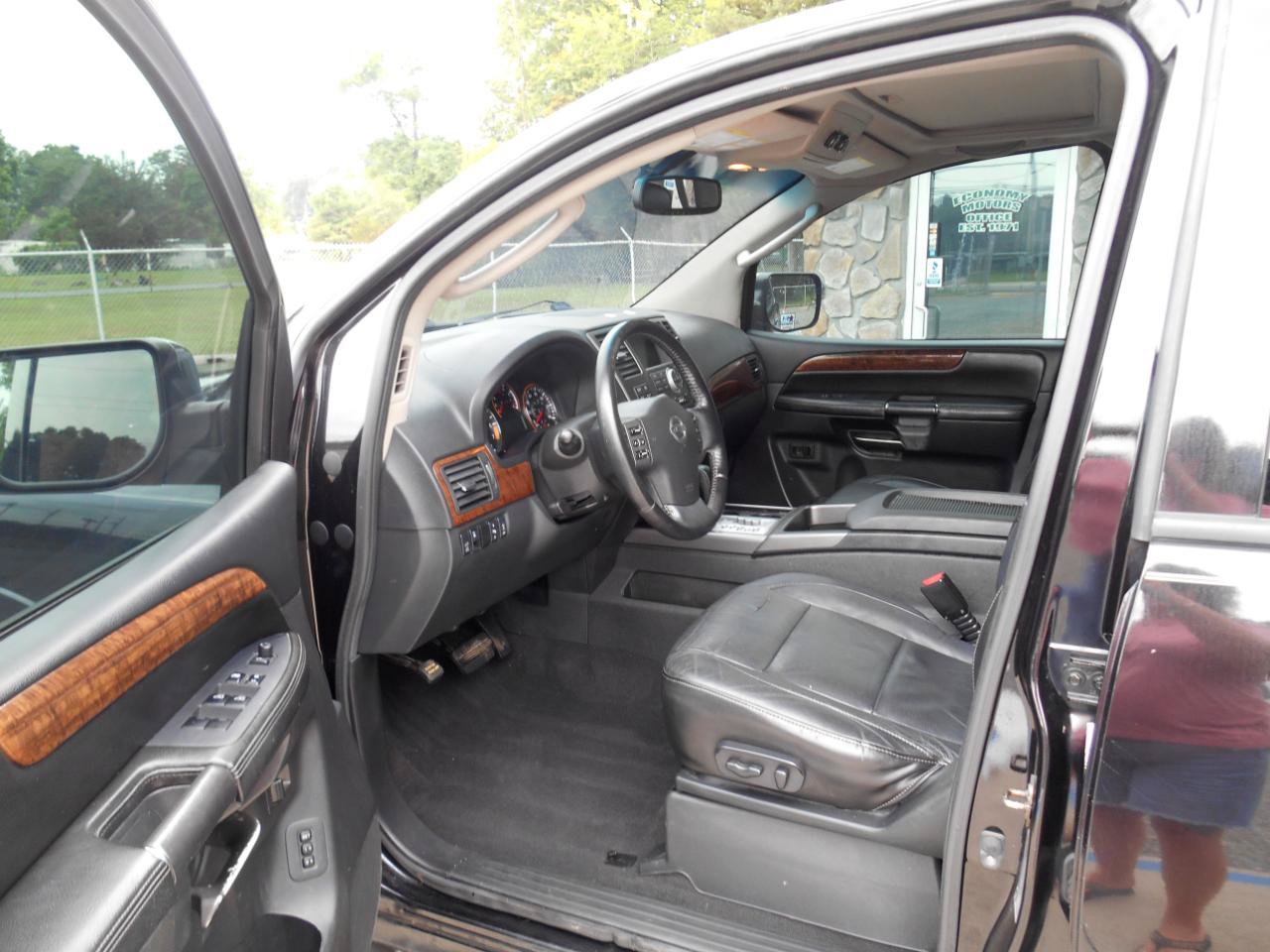 Used 2011 Nissan Armada Platinum w/ 2nd Row Captain Seat Pkg AWD/4WD image 2