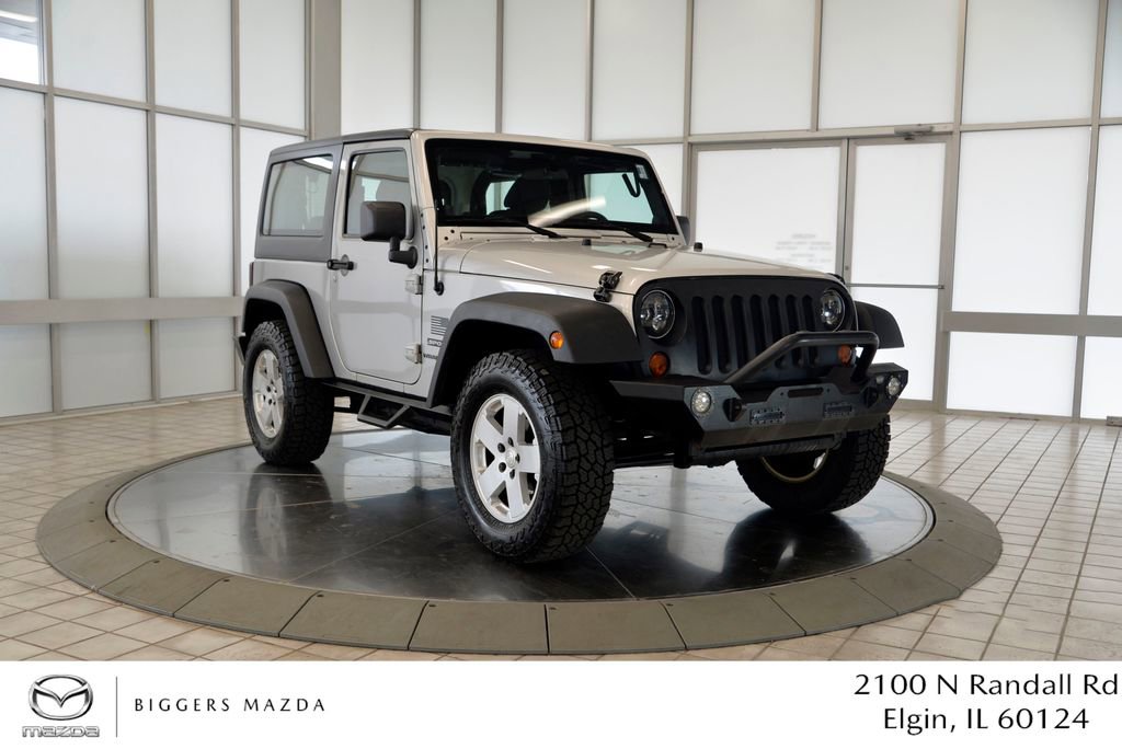 Used 2012 Jeep Wrangler Sport AWD/4WD image 1