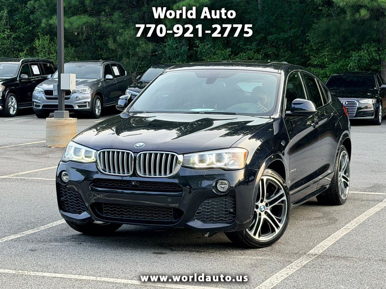 Used 2016 BMW X4 xDrive28i AWD/4WD image 1