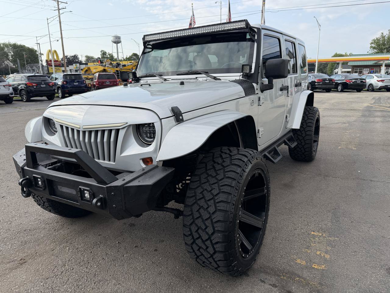 Used 2012 Jeep Wrangler Unlimited Sahara w/ Dual Top Group AWD/4WD image 7