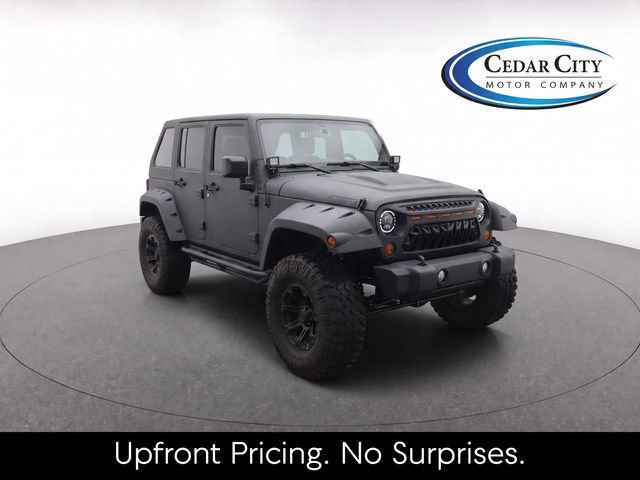Used 2012 Jeep Wrangler Unlimited Sport AWD/4WD image 1