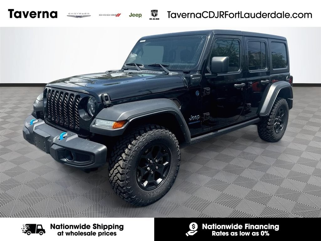 Certified 2023 Jeep Wrangler Unlimited w/ Cold Weather Group AWD/4WD image 1