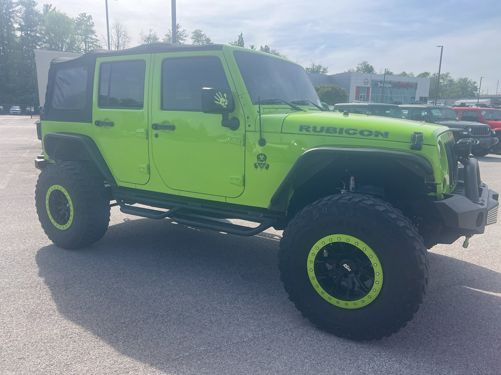 Used 2012 Jeep Wrangler Unlimited Rubicon w/ Dual Top Group AWD/4WD image 7