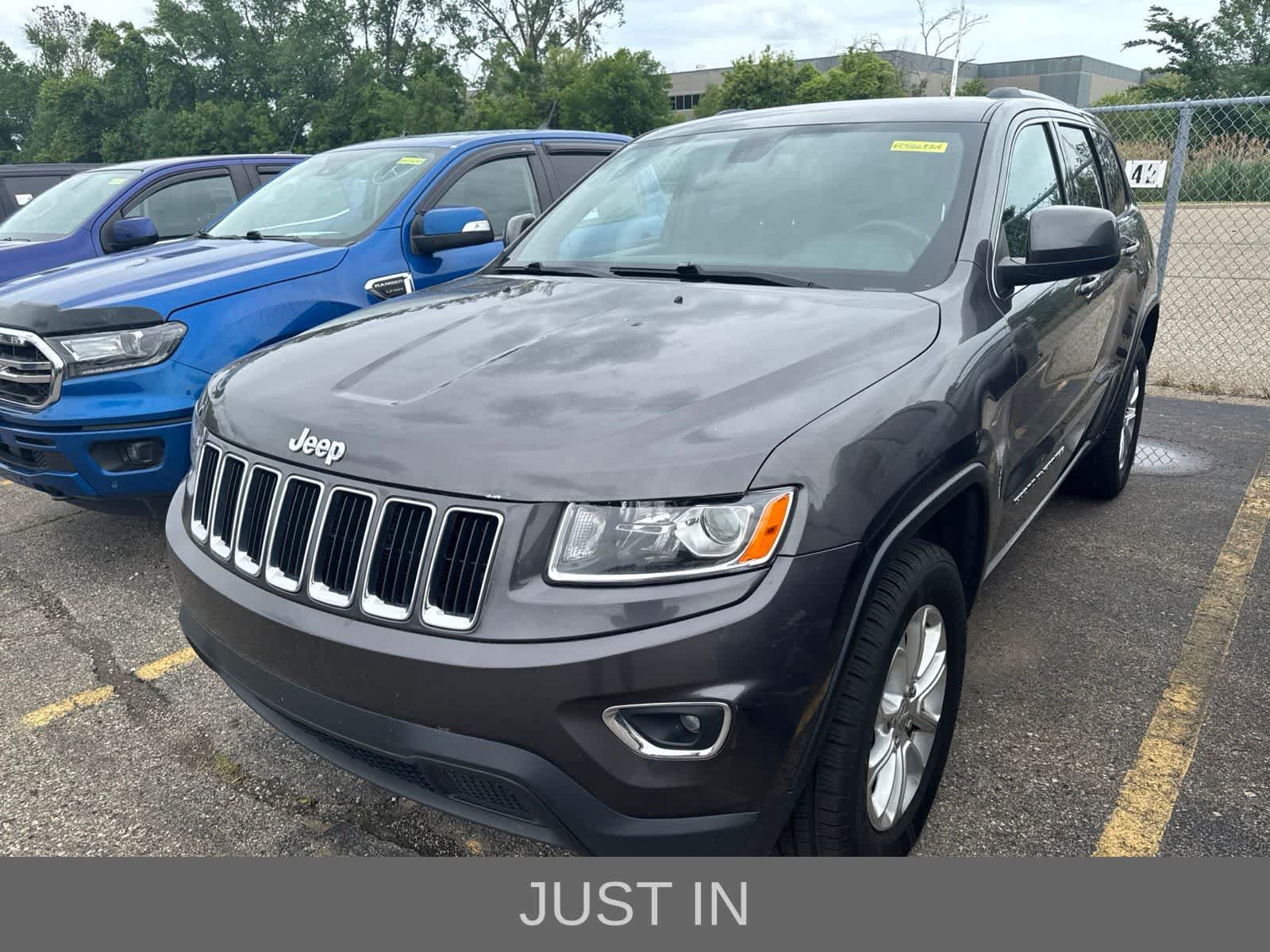 Used 2014 Jeep Grand Cherokee Laredo w/ 18" Wheel & 8.4" Radio Group AWD/4WD image 1