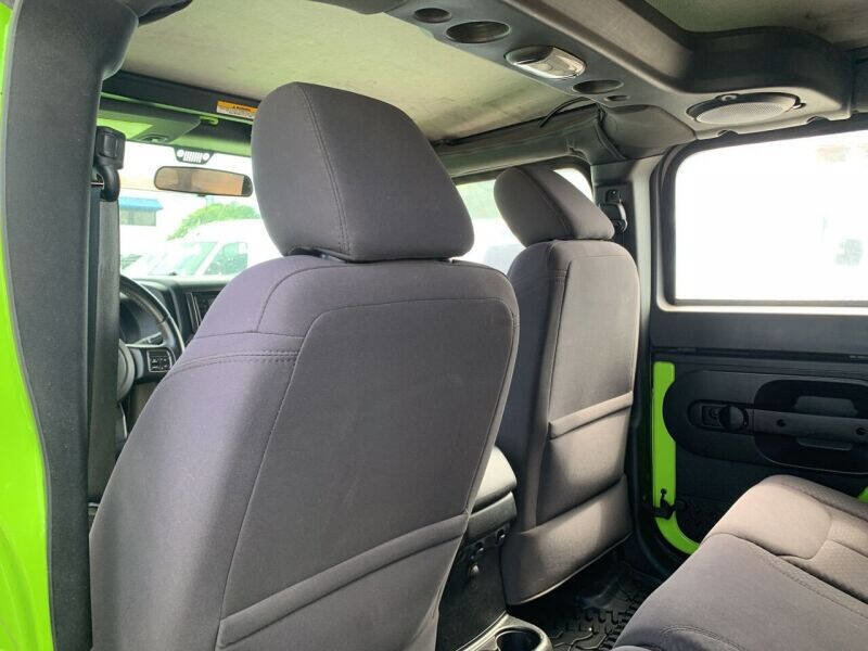 Used 2013 Jeep Wrangler Unlimited Sport w/ Mopar Black Appearance Group image 16