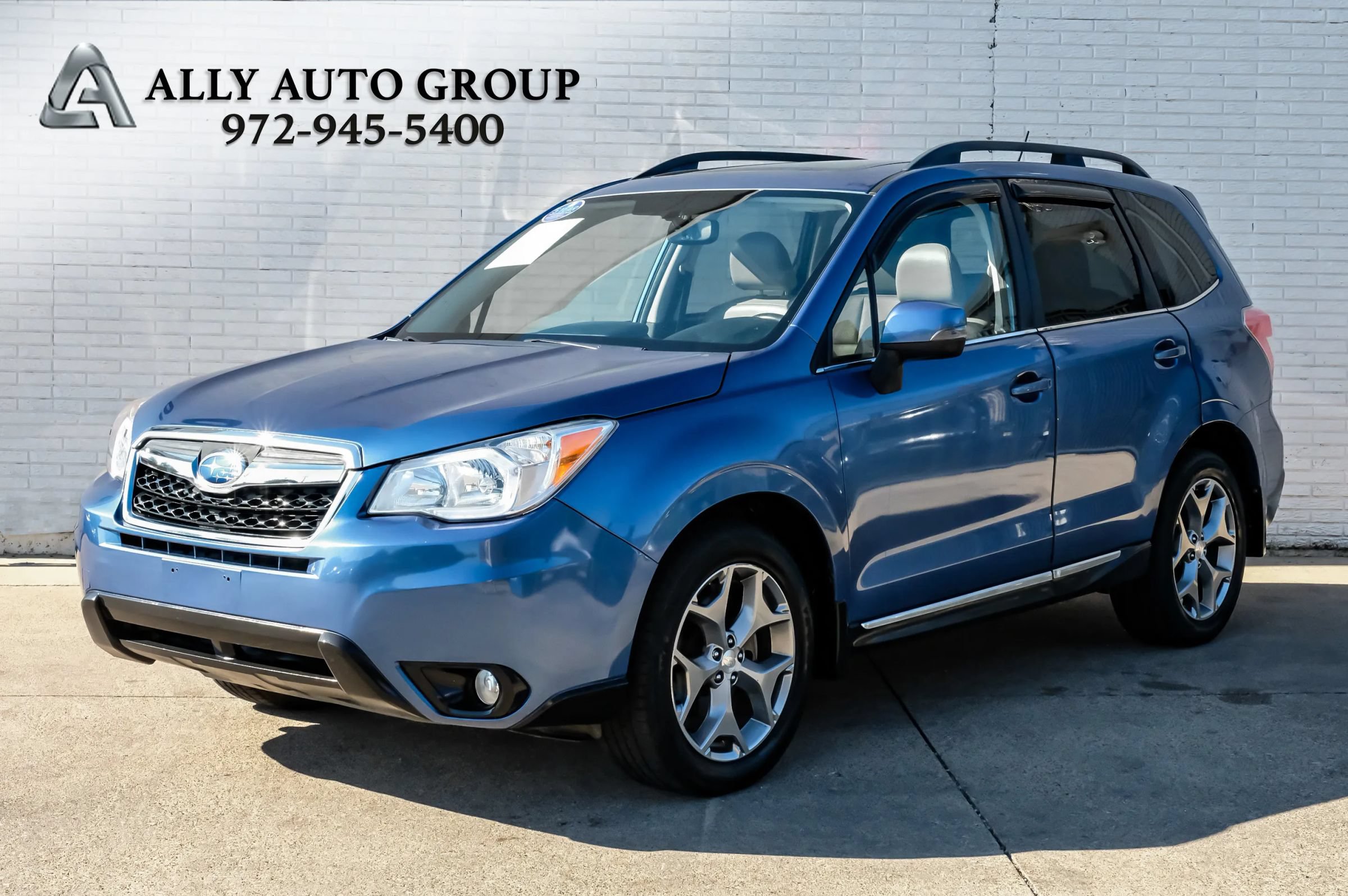 Used 2015 Subaru Forester 2.5i Touring AWD/4WD image 1