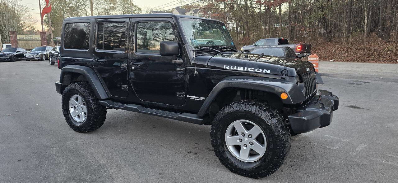 Used 2012 Jeep Wrangler Unlimited Rubicon w/ Dual Top Group AWD/4WD image 4