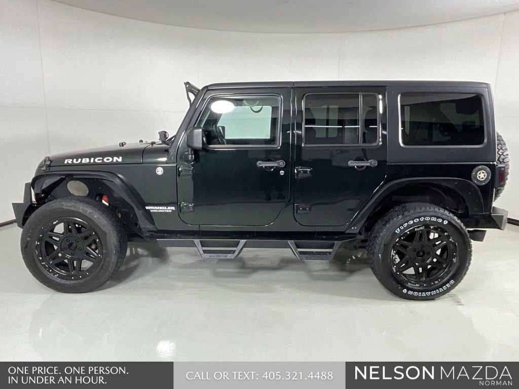 Used 2012 Jeep Wrangler Unlimited Rubicon w/ Connectivity Group AWD/4WD image 9
