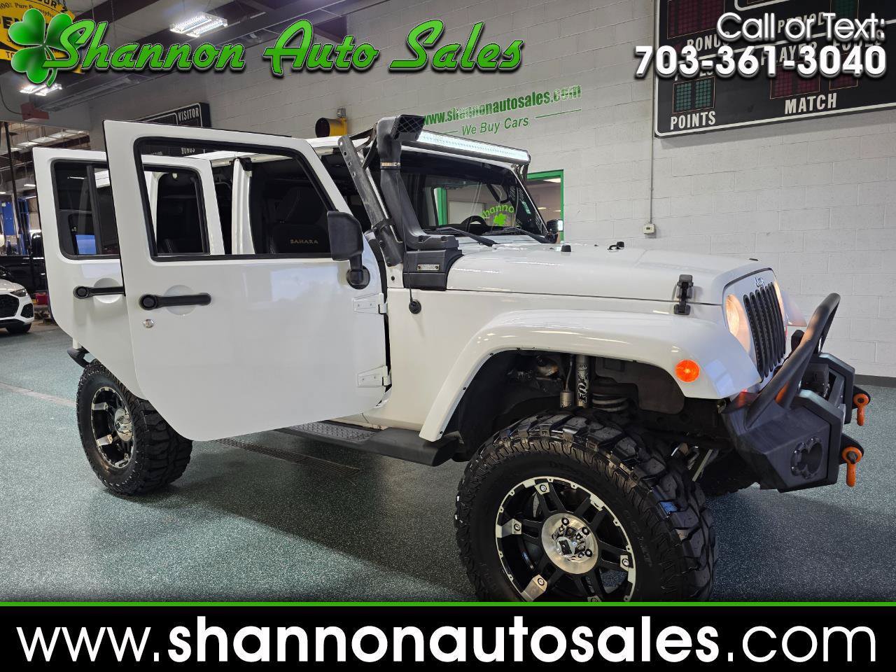 Used 2013 Jeep Wrangler Unlimited Sahara w/ Dual Top Group AWD/4WD image 1