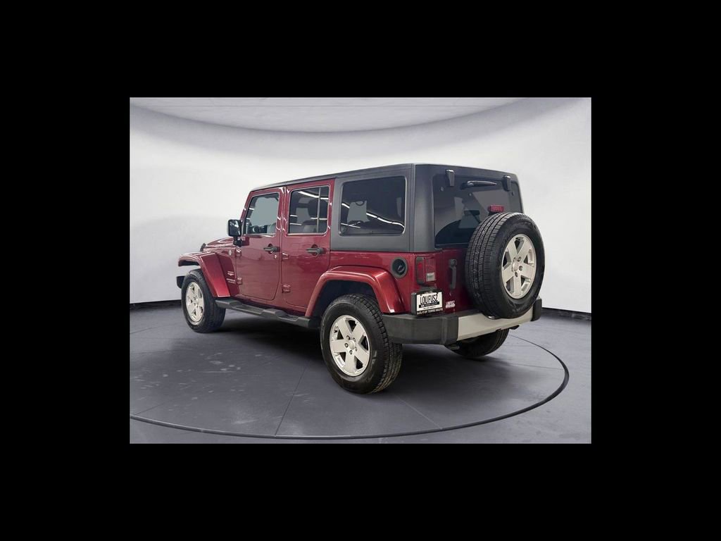 Used 2012 Jeep Wrangler Unlimited Sahara w/ Dual Top Group AWD/4WD image 4