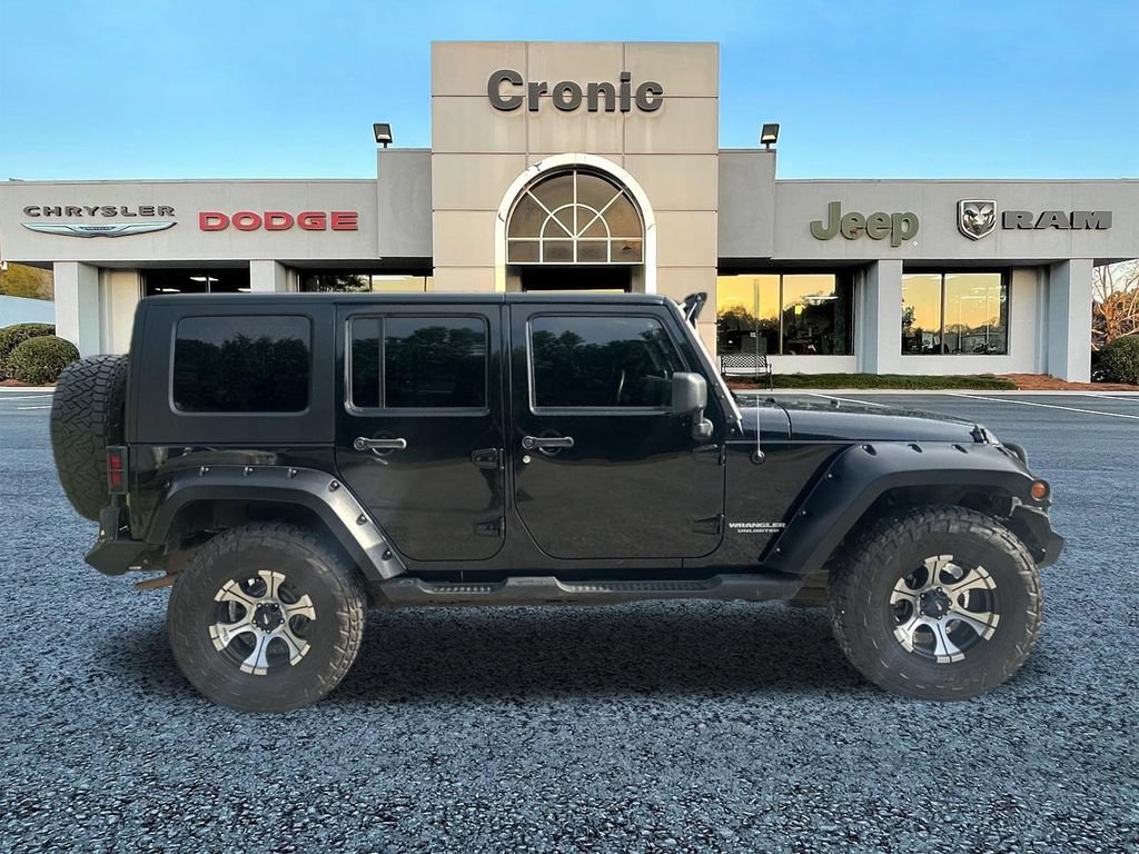 Used 2010 Jeep Wrangler Unlimited Sport AWD/4WD image 2