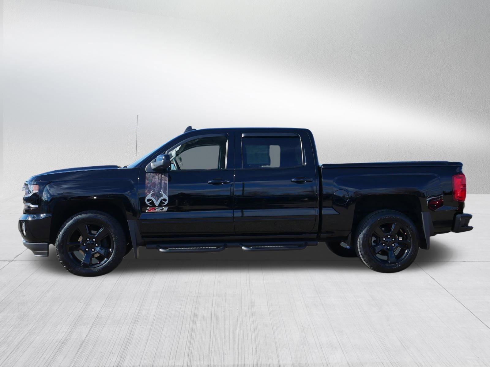 Used 2017 Chevrolet Silverado 1500 LTZ Z71 w/ Realtree Edition AWD/4WD image 4