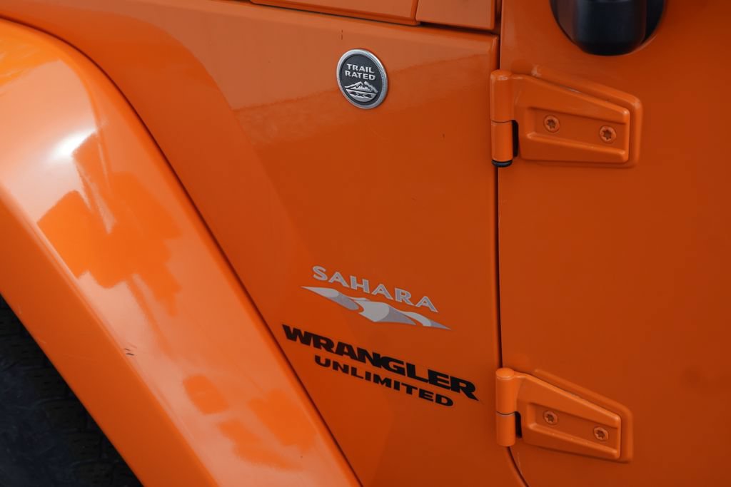 Used 2012 Jeep Wrangler Unlimited Sahara w/ Dual Top Group AWD/4WD image 9