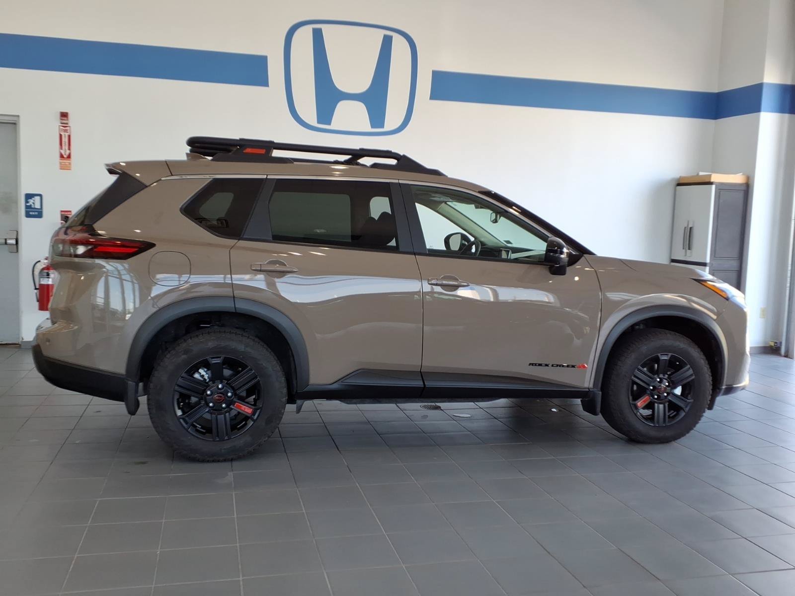 Used 2025 Nissan Rogue SV w/ Rock Creek Premium Package AWD/4WD image 2