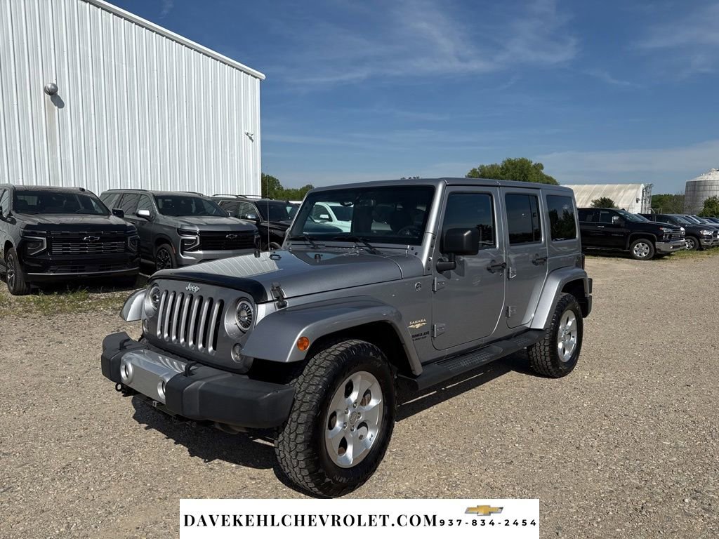 Used 2015 Jeep Wrangler Unlimited Sahara AWD/4WD image 1