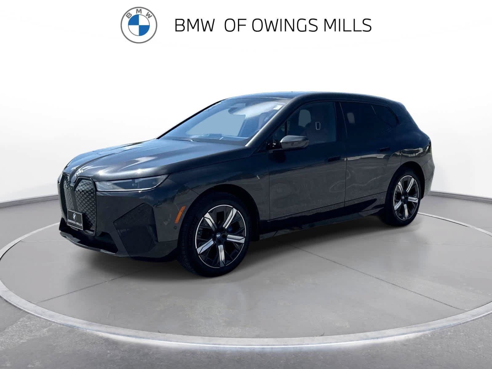 Used 2024 BMW iX xDrive50 w/ Premium Package AWD/4WD image 1