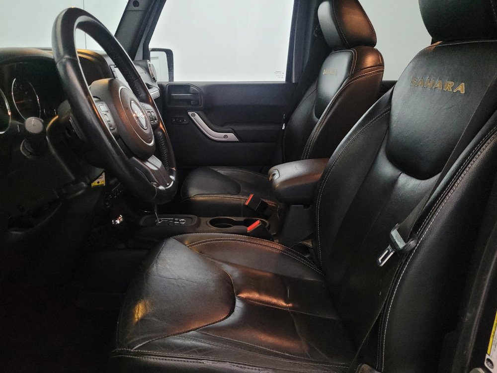 Used 2014 Jeep Wrangler Unlimited Sahara w/ Dual Top Group AWD/4WD image 17