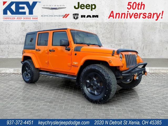 Used 2012 Jeep Wrangler Unlimited Sahara AWD/4WD image 1