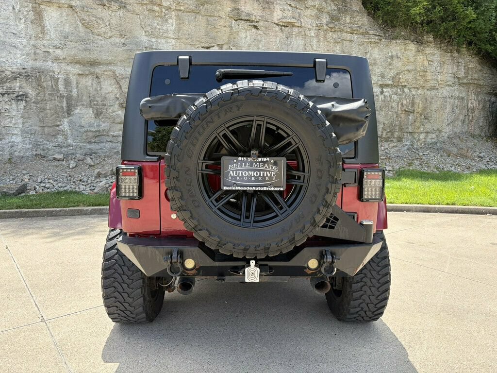 Used 2013 Jeep Wrangler Unlimited Sahara w/ Dual Top Group AWD/4WD image 11