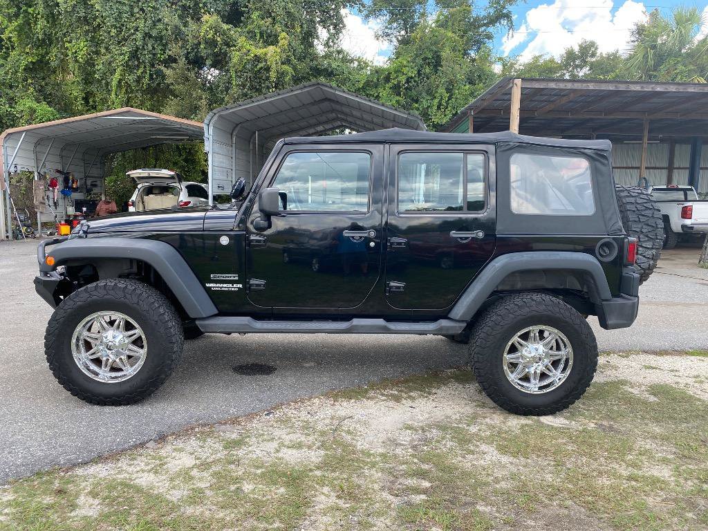Used 2011 Jeep Wrangler Unlimited Sport AWD/4WD image 1