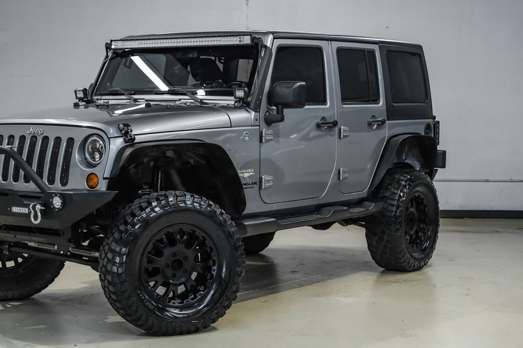 Used 2013 Jeep Wrangler Unlimited Sahara AWD/4WD image 6