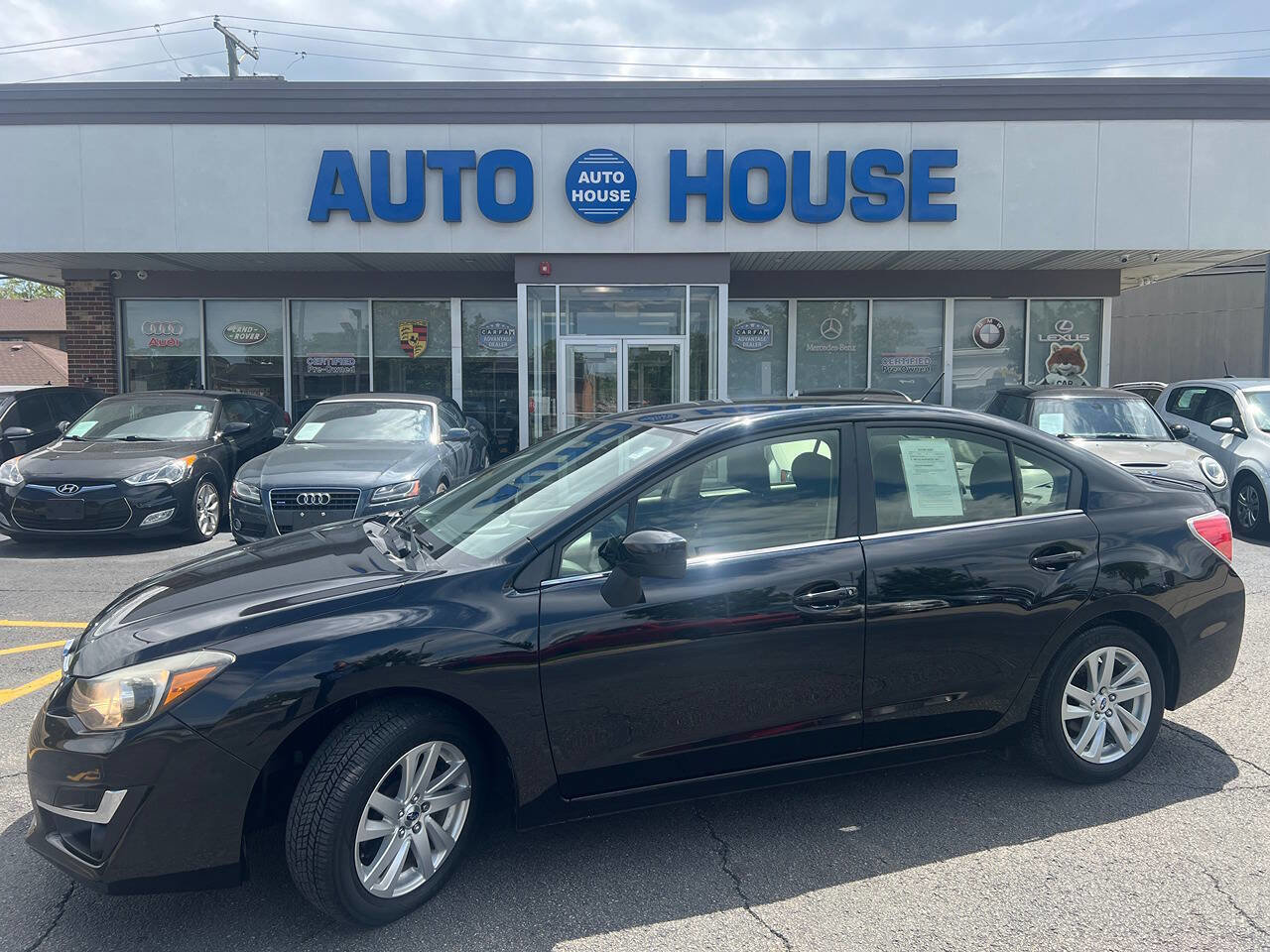 Used 2016 Subaru Impreza 2.0i Premium AWD/4WD image 1
