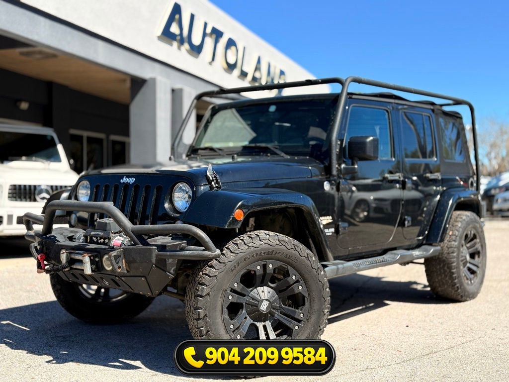 Used 2015 Jeep Wrangler Unlimited Sahara AWD/4WD image 1