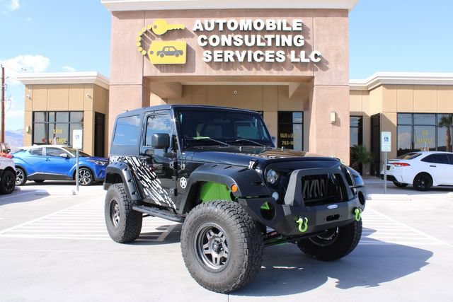 Used 2012 Jeep Wrangler Sahara w/ Connectivity Group AWD/4WD image 1