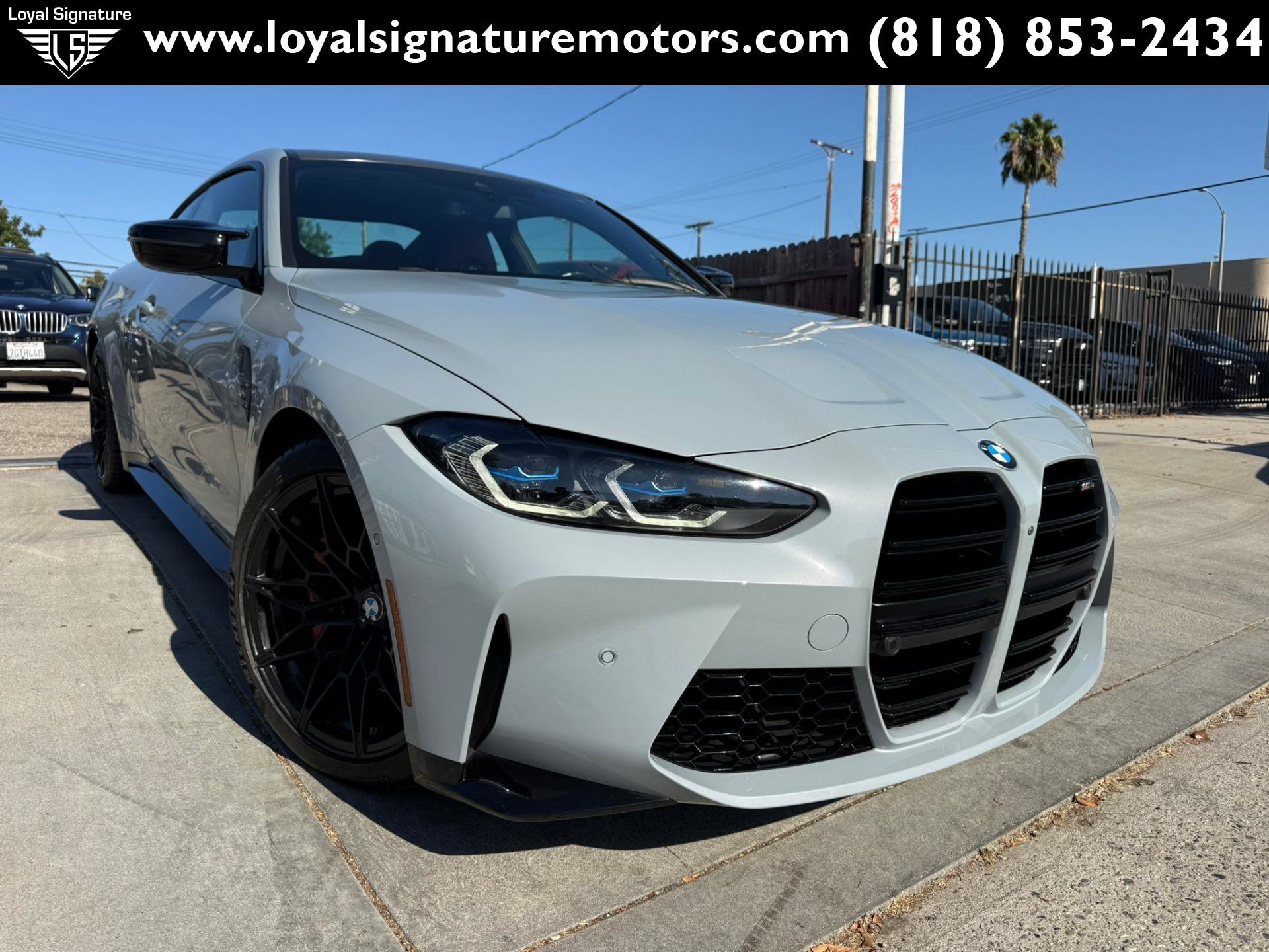 Used 2024 BMW M4 Coupe w/ Executive Package RWD image 1