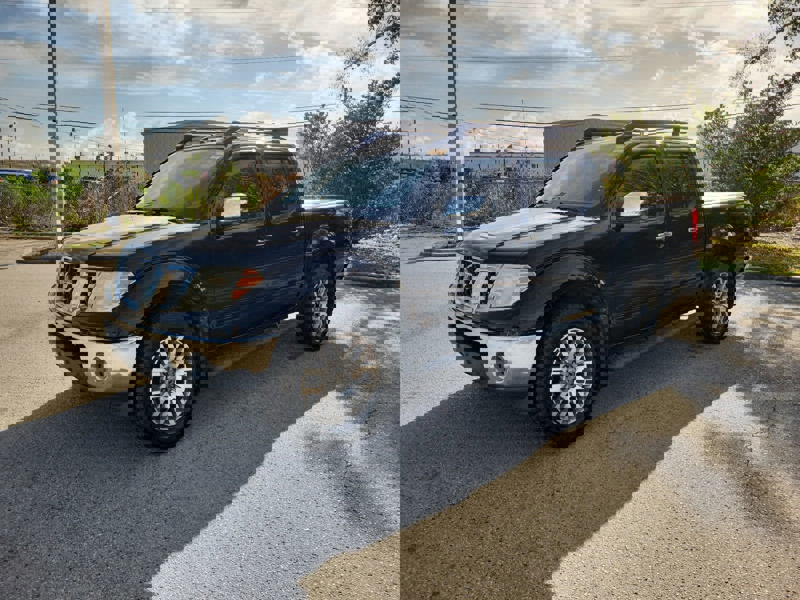 Used 2010 Nissan Frontier LE w/ LE Value Truck Pkg image 1