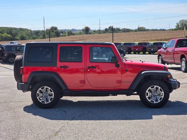 Used 2013 Jeep Wrangler Unlimited Rubicon w/ Dual Top Group AWD/4WD image 9