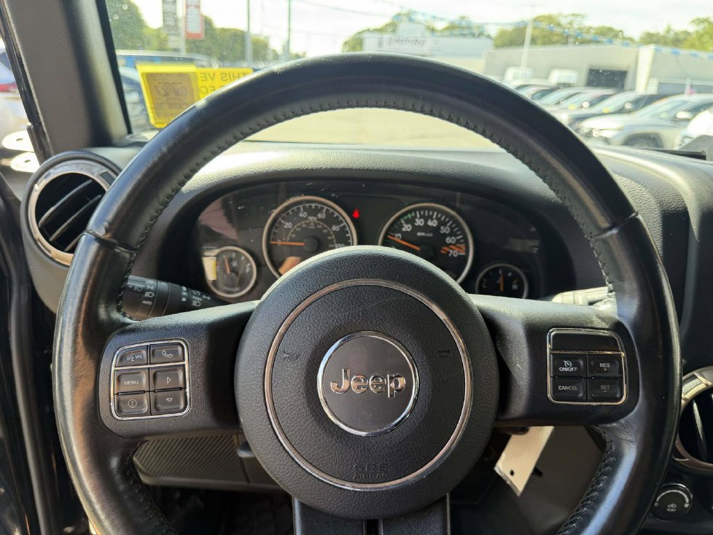 Certified 2016 Jeep Wrangler Unlimited Sahara AWD/4WD image 34
