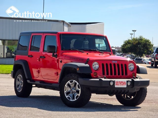Used 2013 Jeep Wrangler Unlimited Rubicon w/ Dual Top Group AWD/4WD image 1
