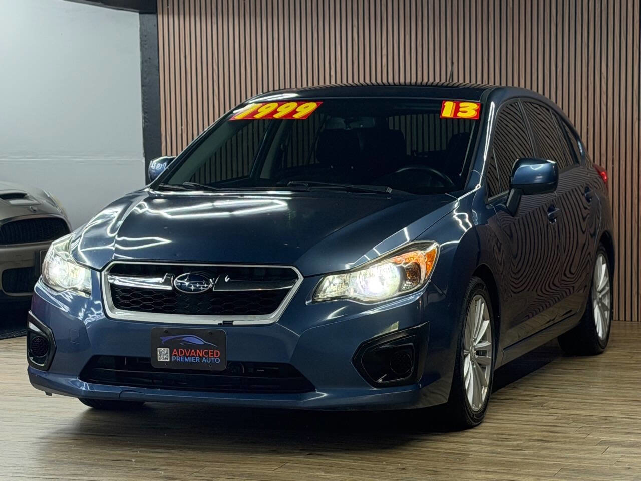 Used 2013 Subaru Impreza 2.0i Premium AWD/4WD image 1