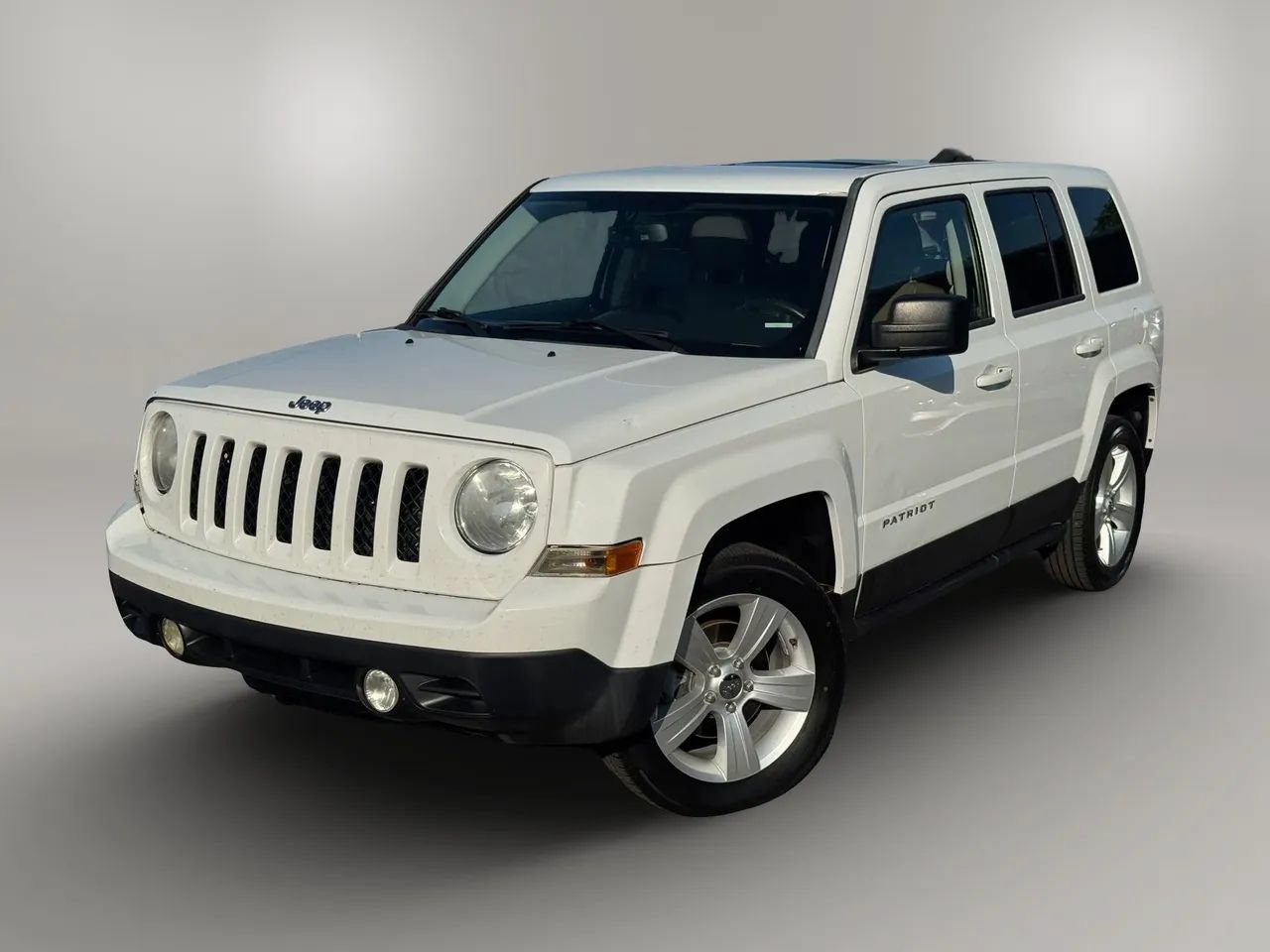 Used 2014 Jeep Patriot Limited w/ Sun/Sound Group FWD image 1
