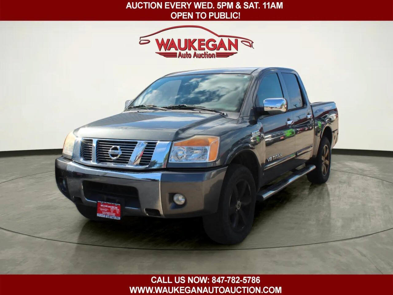 Used 2010 Nissan Titan SE w/ Heavy Metal Edition Pkg AWD/4WD image 1