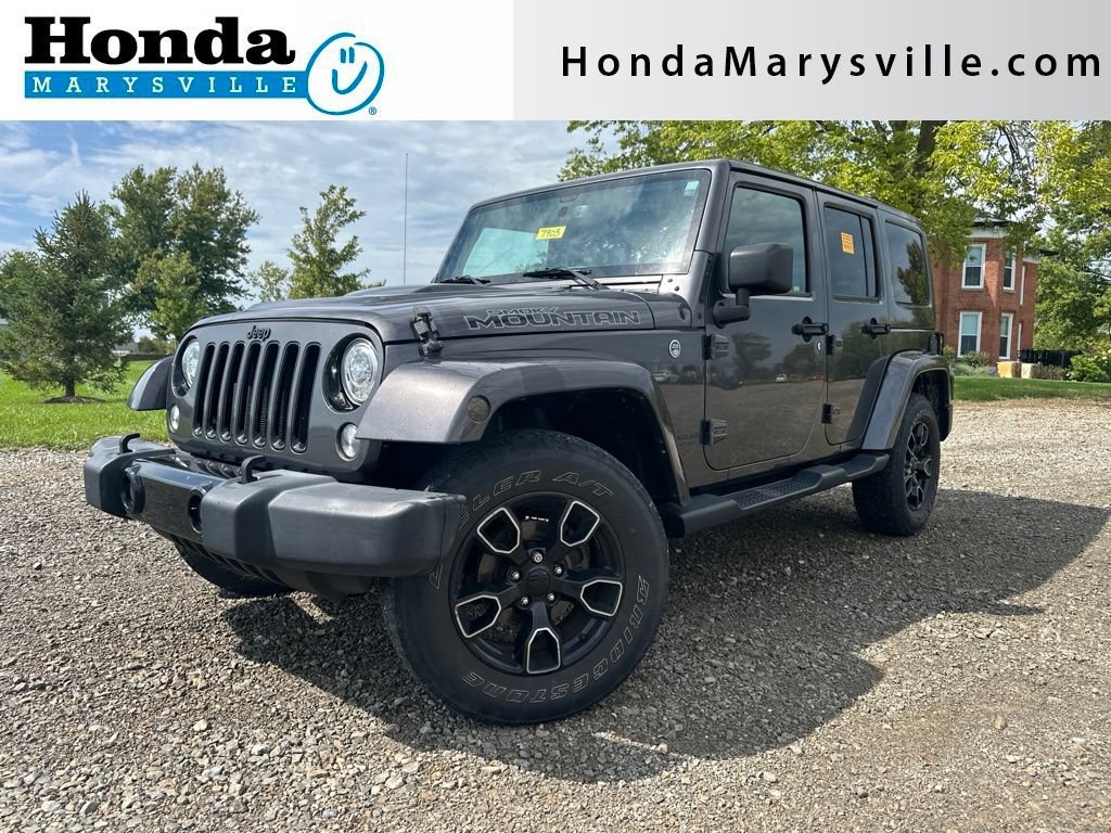 Used 2017 Jeep Wrangler Unlimited Sahara AWD/4WD image 1