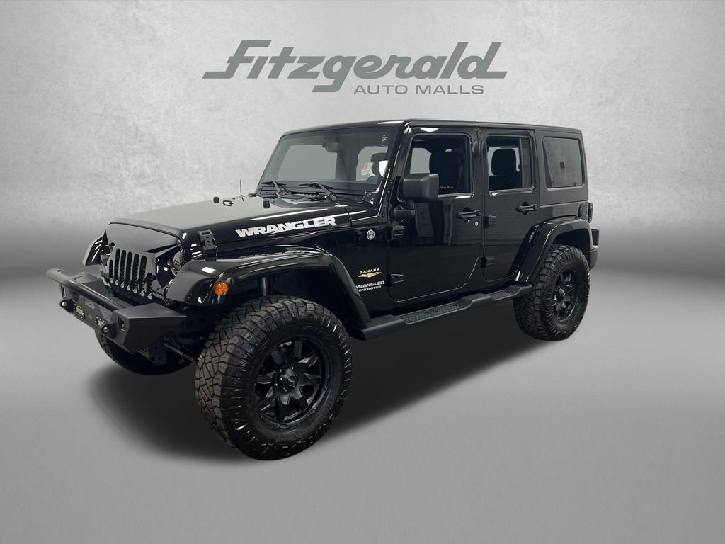 Used 2013 Jeep Wrangler Unlimited Sahara w/ Connectivity Group AWD/4WD image 1
