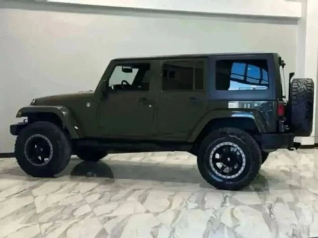 Used 2015 Jeep Wrangler Unlimited Sahara w/ Max Tow Package image 29