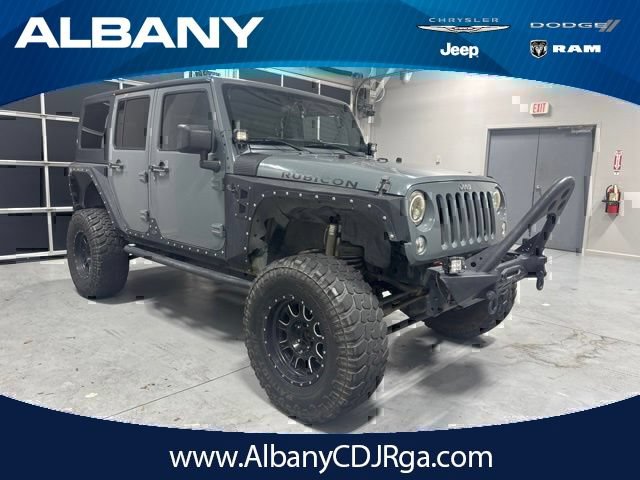 Used 2014 Jeep Wrangler Unlimited Rubicon w/ Max Tow Package AWD/4WD video 1
